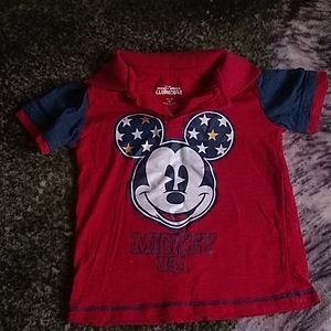 This little boys Polo shirt by Disney is size 5T with Mickey Mouse emblem